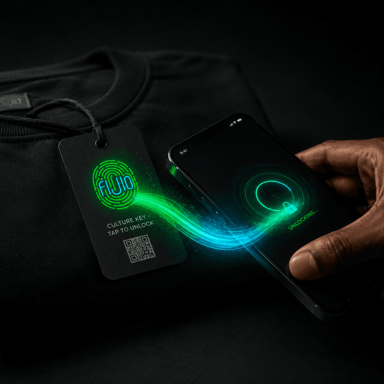 A phone tapping the Fijio Culture Key tag, unlocking in teal-green light