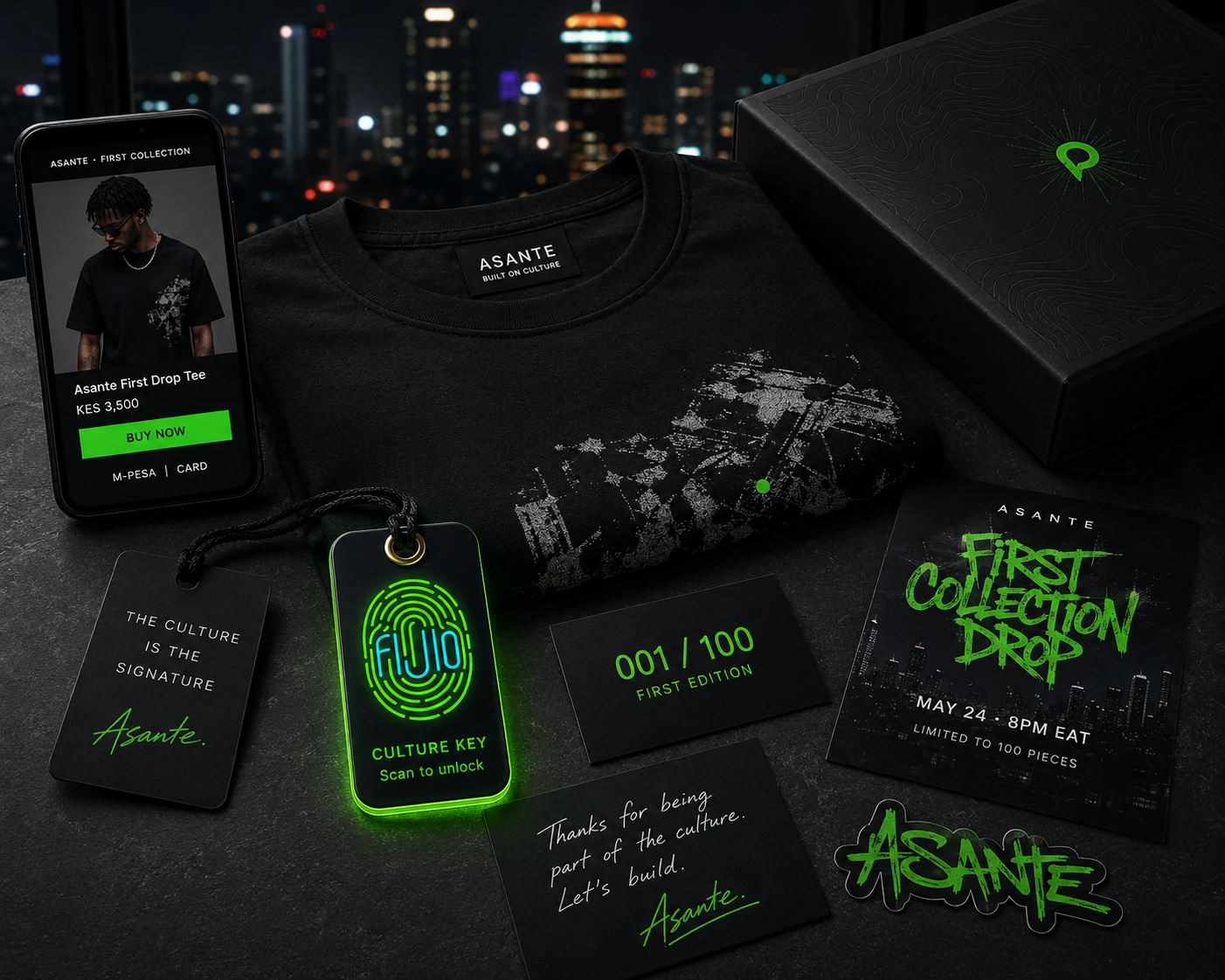 Streetwear starter Signature example — Asante first collection: storefront on a phone, folded tee, glowing FIJIO Culture Key tag, 001/100 first-edition card, and First Collection Drop poster